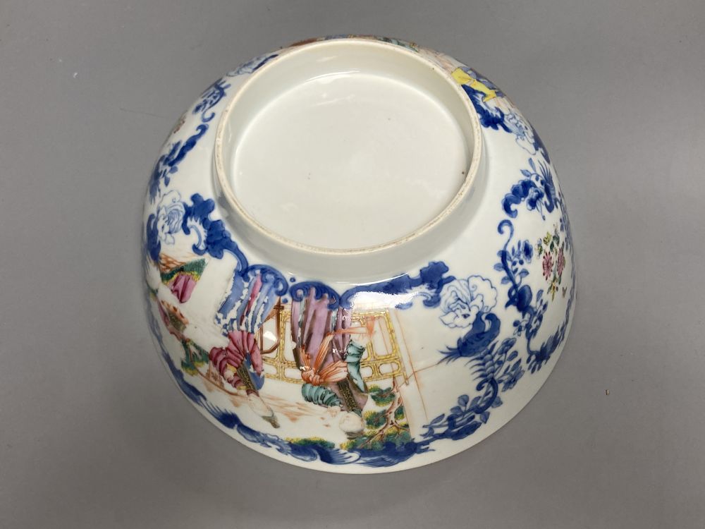 A Chinese famille rose punch bowl, Qianlong period, enamel painted in underglaze blue with famille rose enamels, figures in pavilions,